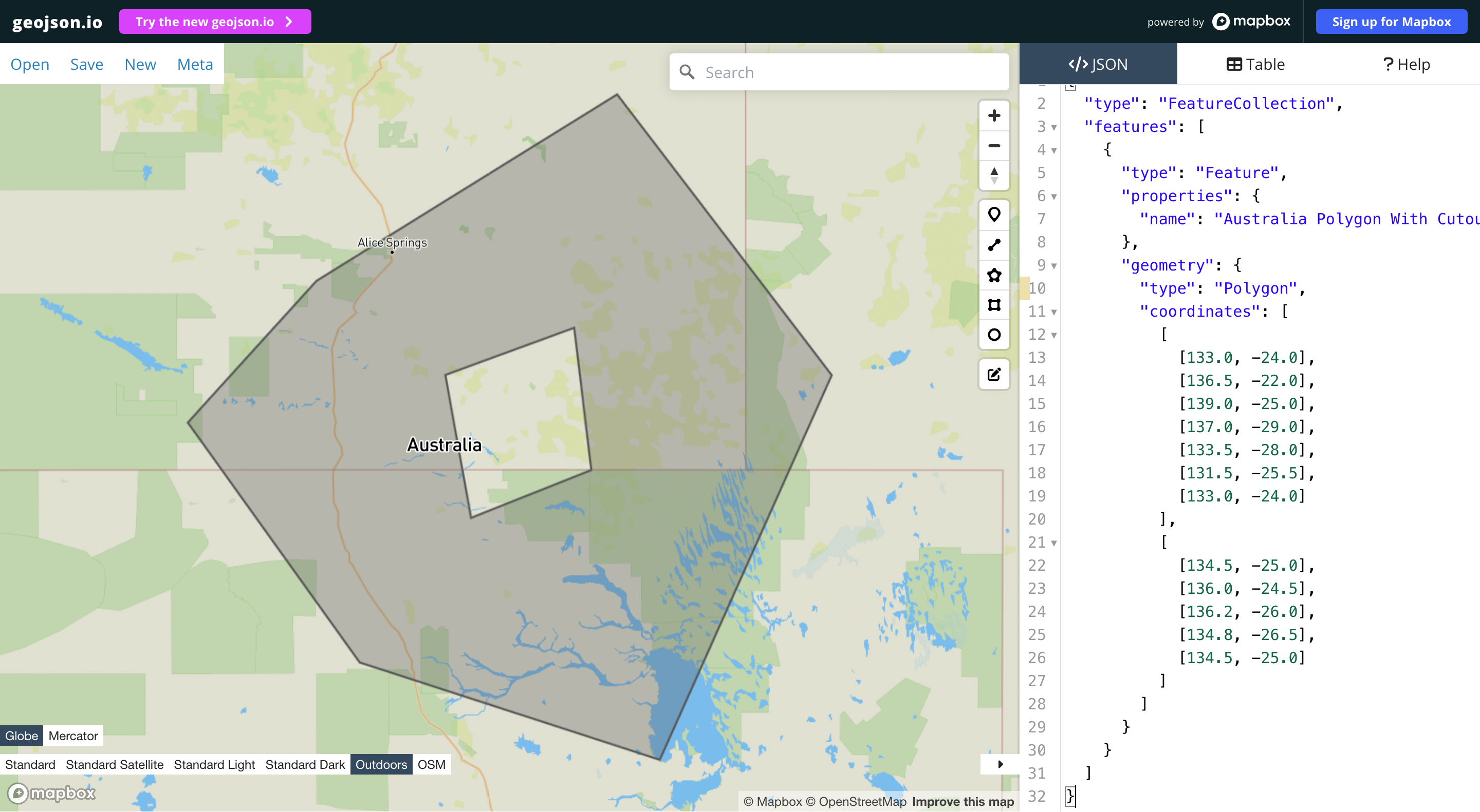 GeoJSON polygon with cutout visualized